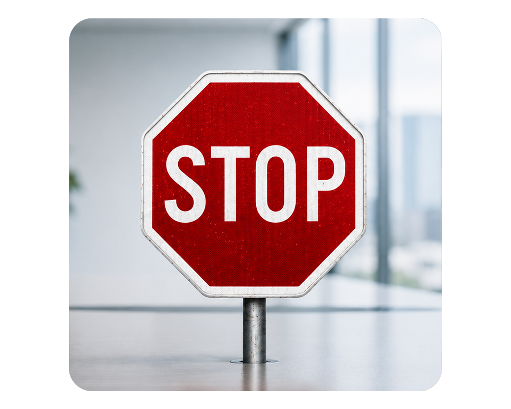 Stop sign on a conference table